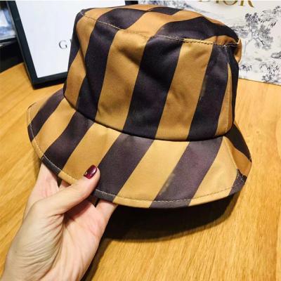 China Barred 2021 New Fisherman's Hat Classic Striped Sun Hat Ladies Luxury Restored Fashion Accessories for sale