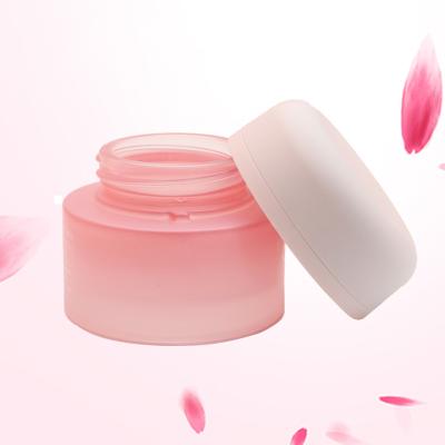 China Eco-friendly Customized 30g 50g Luxury Flat Round Face Cream Jar Empty Cosmetic Glass Jars for sale