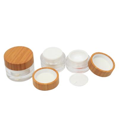 China Wholesale Cosmetic Containers Eco-friendly Round Shaped Double Wall 50g Bamboo Cream Jar Acrylic Cream Jar With Bamboo Wood Lid for sale