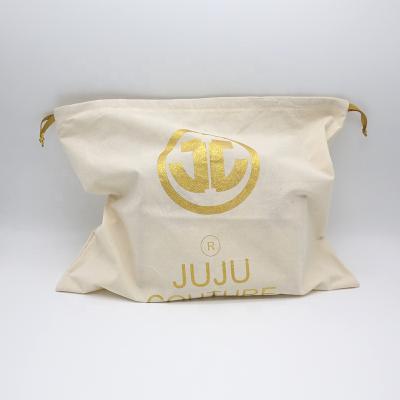 China Recyclable Large Organic Cotton Pouch Custom Gold Foil Cotton Drawstring Pouch for sale