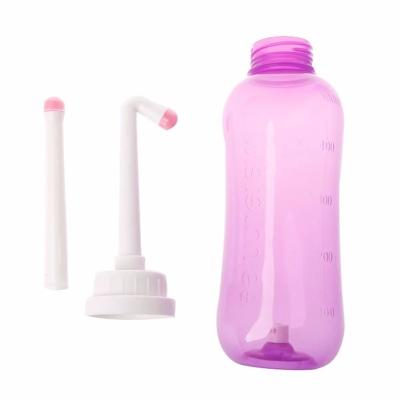 China New Travel 500ml Sefl-Cleaning Portable Handheld Bidet Sprayer Personal Hygiene Cleaner Bottle Jet Wash for sale