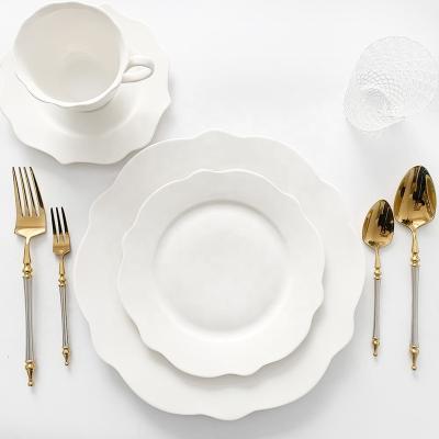 China Viable Custom Design Flower Shape White Ceramic Vintage Dinner Dishes Set for sale