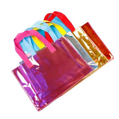 China Fashion laser bag new design PVC colorful handle bag folding custom portable shopping bag for sale