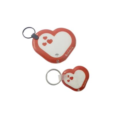 China PVC Rubber Heart Shaped Key Ring Plastic Key Ring With Light for sale