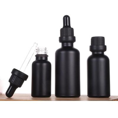 China Spill Non Selling Best 30ml Matte Black Frosted Glass Essential Oil Bottle 10ml 30ml Bread Oil Dropper Bottle for sale