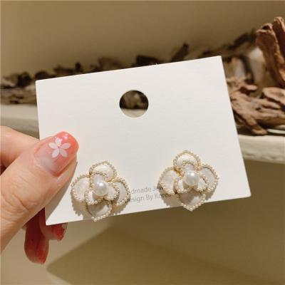 China FASHIONABLE Silver Flower Earrings Enamel Needle Vintage 925 Pearl Stud Earrings Korean Jewelry for sale