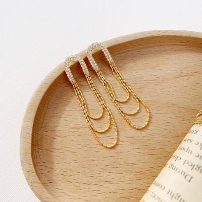 China Trendy Korean Fashion Chain Tassel Earrings Long Gold Style Tassel Drop Zircon Earring for sale