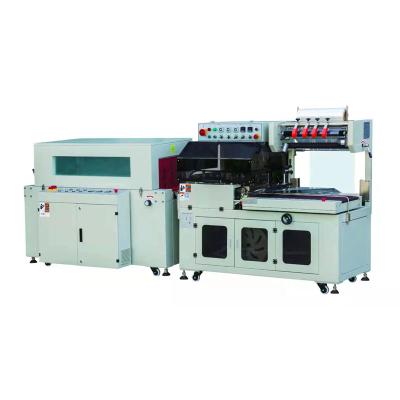 Κίνα Hot sale heat shrink wrapping machine for cosmetic sample fast food instant noodles fruits packing machine προς πώληση