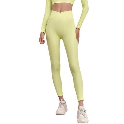 China Breathable Yoga Sports Woman Sports Fitness Pants Waist Hip Pocket Running Quick Dry Pants High Long Pants for sale