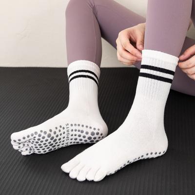 China Breathable 5 Toe Calf Toe Yoga Socks Full Toe Dispensing Small Bar Non-slip Striped Warm Pure Color Pipe Medium Socks for sale