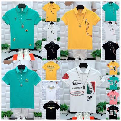 China Anti-wrinkle New Summer T Shirts for Men  Short Sleeve Turn-down Collar Letter Printing Button Striped Polo Tees Fashion Pullover Tops for sale