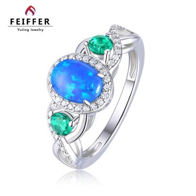 China Romantic Newcomer Wedding Jewelry Rhodium Plated 925 Silver Blue Opal Engagement Ring With Gems for sale