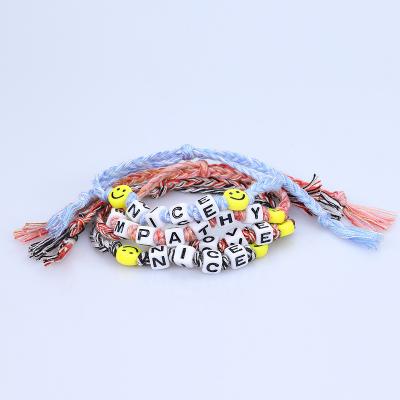 China Other New Fashion Hip Hop Bracelets with Smiley Letter Tassel Handmade Woven Bracelets for sale