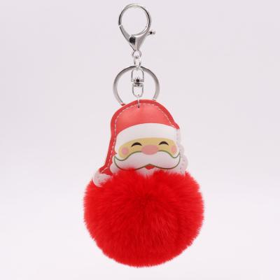 China 2021 Metal / Plush Christmas Plush Pom Key Chain Leather Santa Key Chain for sale