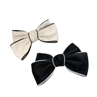 China 2021 Autumn Winter Imitational Wool Bow Black And White Hairpin Street Style for sale