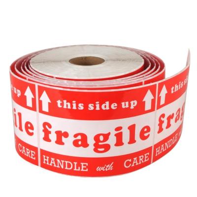 China Waterproof handle with care stickers fragile warning label for shipping box outer packaging for sale