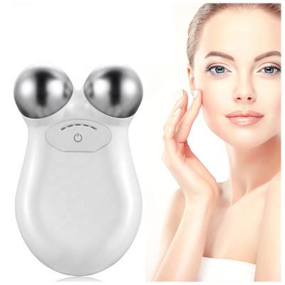 China Professional Portable Healthy Skin Care Tool EMS Ion V Shape Face Sculpting Tool Microcurrent Massager Mini Facial Toning Device Face Lift Roller for sale