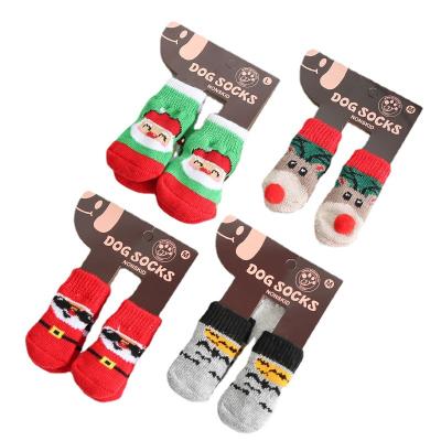 China 2021 New Fashion Pet Christmas Ornaments Pet Supplies Cats Dogs Santa Socks Fabrics for sale