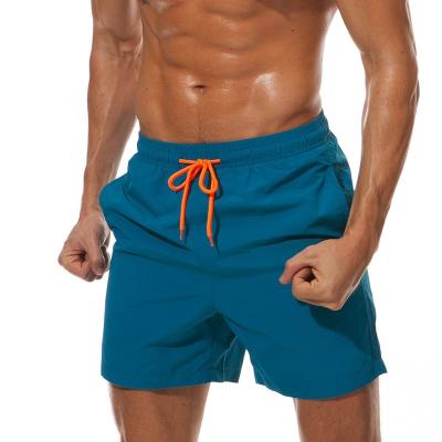 China Breathable Mens Shorts Solid Plus Size Men Swim Trunks Breathable Elastic Running Sports Surfing Shorts Summer for sale