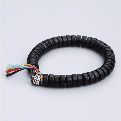 China 2021 FASHIONABLE Creative Black Round Handmade Coconut Shell Sanskrit Engraving Beaded Weave Bracelet for sale