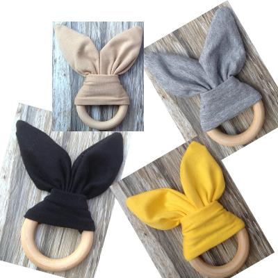 China Toy Baby Teether Wood Ring Soft Using Sensory Ring Teething Newborn Bunny Ears Handmade Cloth Wood Baby ToysTraining Baby Teether for sale