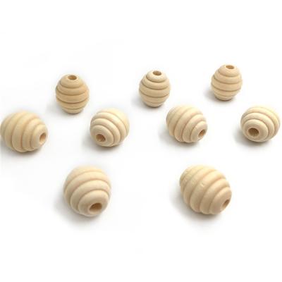 China Soft Toy Unfinished Beehive Raw Wood Round Beads For DIY Teether Wooden Necklace Original Honeycomb Beads for sale