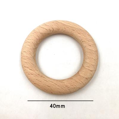 China Food Grade Toy Beech Wooden Teething Rings BPA Free Soft Teethers 40mm DIY Accessories Rings Wooden Baby Teethers for sale