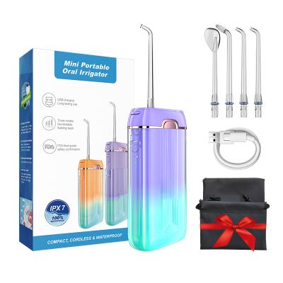 China 360 Rated Travel Mini Water Floss Irrigator Oral Jet Cordless Manufacture Dental Portable Nozzle Use 140ml Electric Flosser for sale