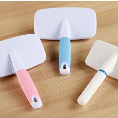 China Sustainable Pet Sweeps Pet Rubber Slicker Brush Painless Pet Deshedding Cat Hair Remover for sale