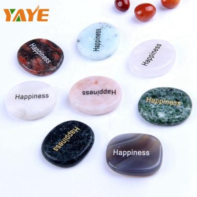 China Wholesale Europe Tumbled Flat Palm Stones Engraved Words Stones For Decor for sale