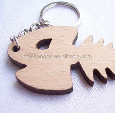 China Europe HAPPINESS Fish Bone Shaped Wooden Key Chain for sale