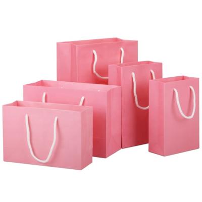 China Custom Made Recycled Materials New Arrival Fashion Garment Shopping Bag Baby Shower Celebration Birthday Wedding Pink Paper Bag for sale