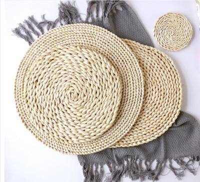 China Eco-Friendly Woven Rattan Place Mat Round Braided Straw Placemats Customized Table Mat for sale