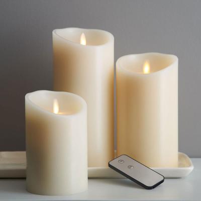 China Flameless Ivory White Red Battery Operated Movable Wick Led Flameless Candles With Remote Control Timer for sale