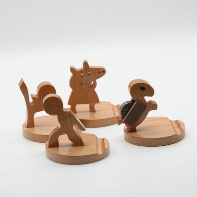 China Eco-Friendly Beech Wood Cartoon Phone Stand Phone Stand For Promotion for sale