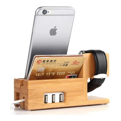 China Rope Wooden Bamboo Desktop Mobile Phone Amazon Stand Charging Stand with 3 Slots for iPhone and iPad USB Charging Stand for sale