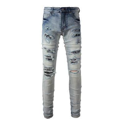 China Viable trend men's clothing streetstyle knee ripped skinny light blue skinny jeans men's skinny legs patch jeans for men distress for sale