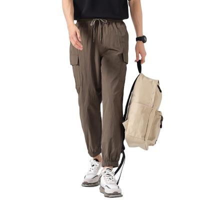 China Anti-Wrinkle Pocket High Quality Drawstring Edge Cotton Unisex Elastic Sweatpants For Men Joggers for sale