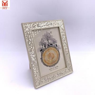 China Wholesale Environmentally Friendly Plastic Gold Luminous Outdoor Hexagon Embossed Picture Frame Picosecond Picture Frame Design Small for sale