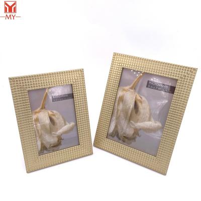 China Environmentally Friendly Customizable Wholesale Customizable Square Photo Frame Wall Mount PS Texture Design Gold Frosted Pattern Small Embossed Picture Frame for sale