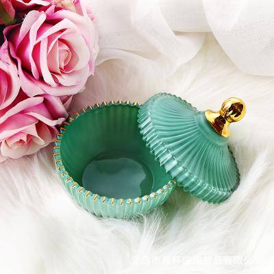 China Home Decoration Aromatherapy Candle Wide Mouth Green Frost Glass Candle Jar With Lid for sale