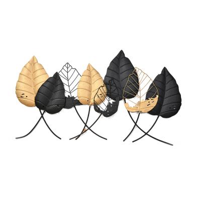 China Minimalist Black Golden Wall Art Home Decoration Wrought Iron Gold Product Leaf Metal for sale