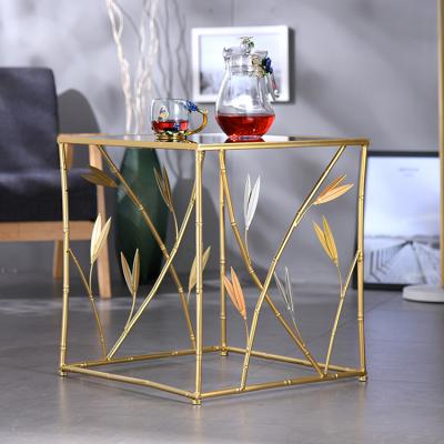 China Minimalist Hollow Out Side Luxury Nordic Metal Furniture Branch Bed Cafe Modern Table for sale