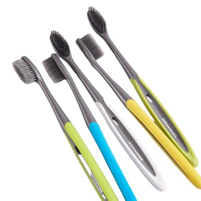 China Hot Sale Custom Carbon Toothbrush Brush For Adult Custom Logo Porcelain Toothbrush New Charcoal Bristles Toothbrush Manufacturer 4 Packs for sale