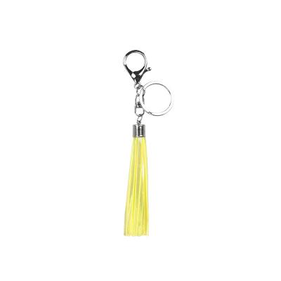 China EN13356 Plastic Yellow Tassel Keychain Pending Reflective Key Chain for sale