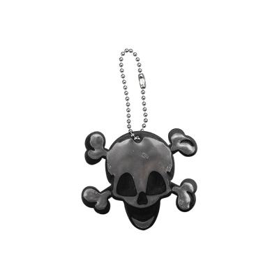 China Easy To Wear EN13356 Cute Skull Pendant Keychain Reflective PVC Reflector for sale