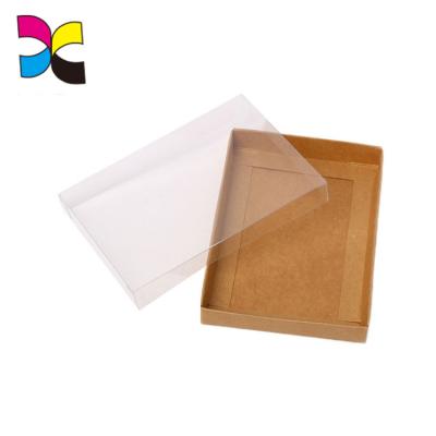 China Recyclable Clothes Packaging Kraft Paper Box With Plastic Transparent Lid for sale