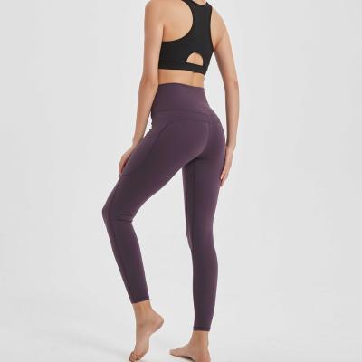 China Breathable Fashion High Waist Girl Wear Yoga Pants Custom Logo Leggings With Pocket for sale