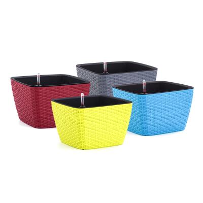 China Eco-friendly Unique Outdoor Rattan Railing Self Watering Plastic Planter Flower Plant Pots for sale