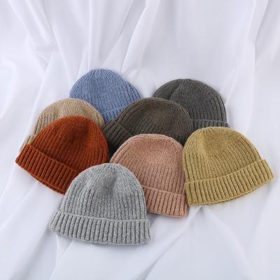 China COMMON In Running Multicolor Solid Dye Knitted Beanie Custom Woven Beanie Winter Warm Hat for sale